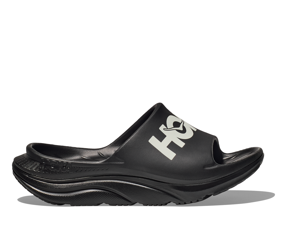 HOKA Ora Athletic Slide Unisex Black White — vista lateral