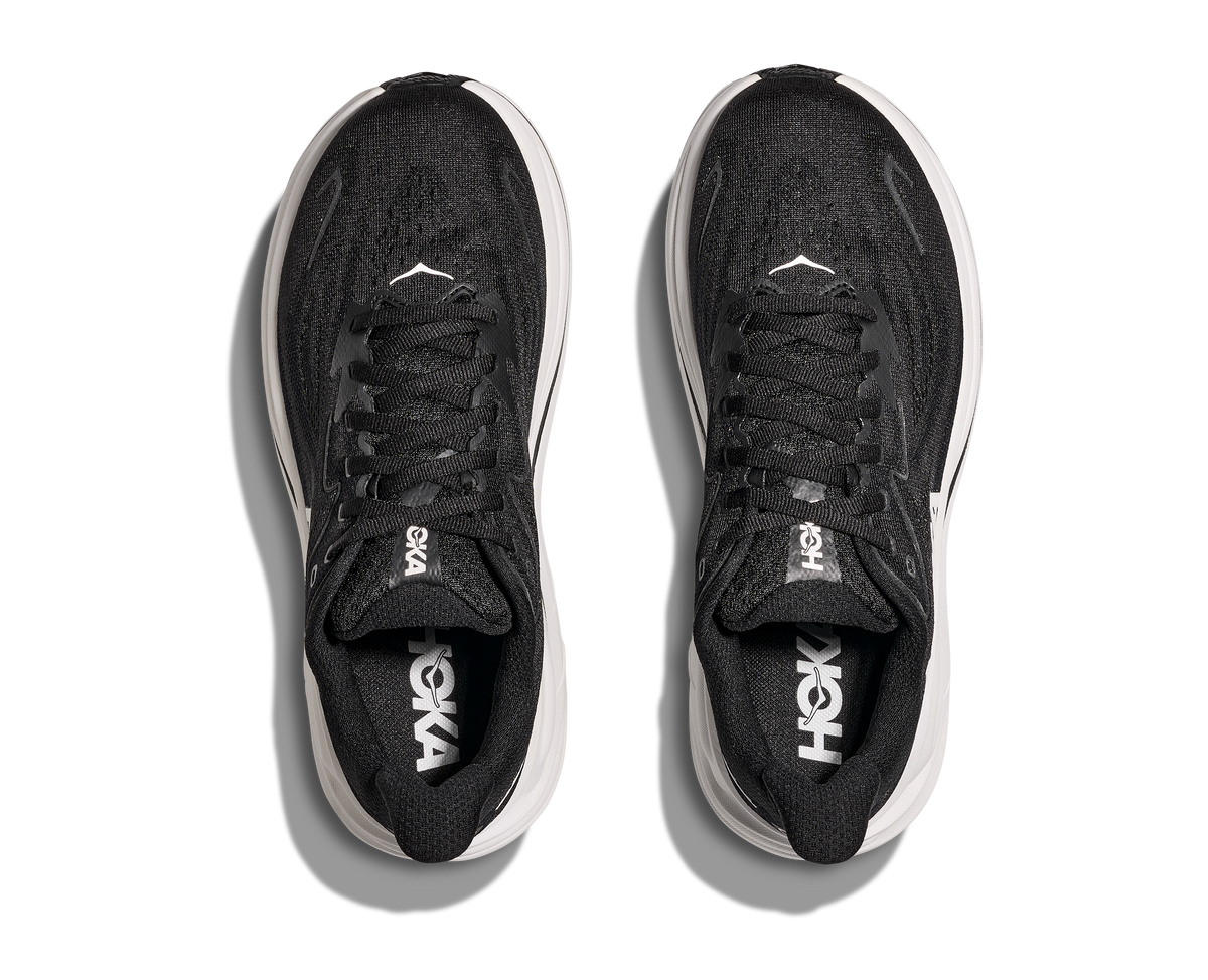 HOKA Clifton 10 Hombre Black White — vista medial