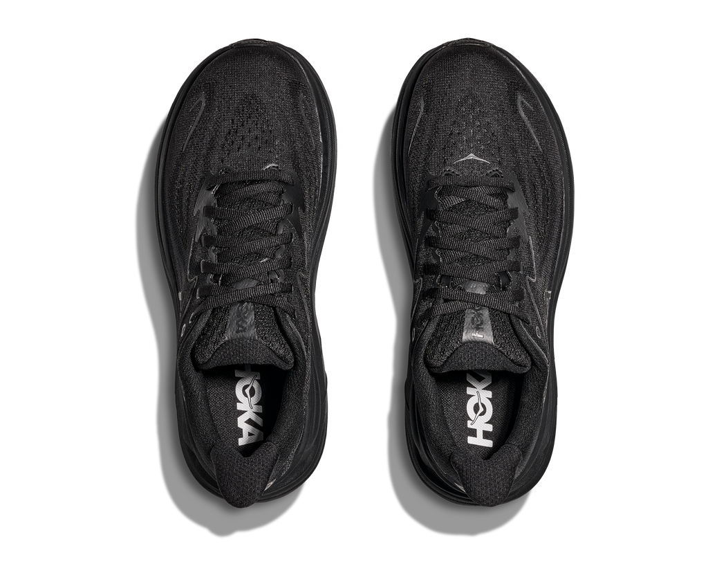 HOKA Clifton 10 Wide Hombre Black Black — vista medial