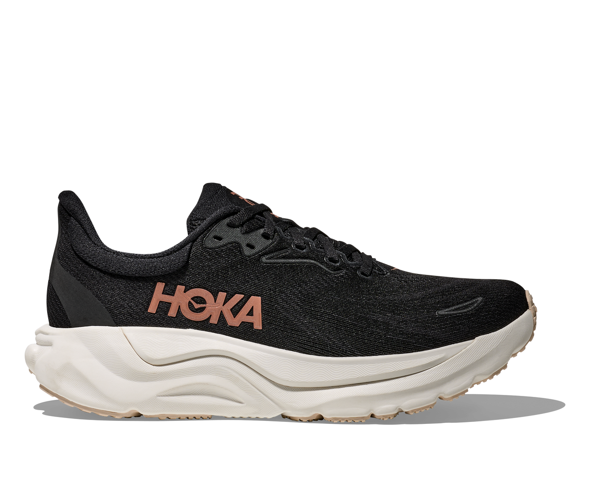 HOKA Arahi 8 Mujer Black / Rose Gold — vista lateral