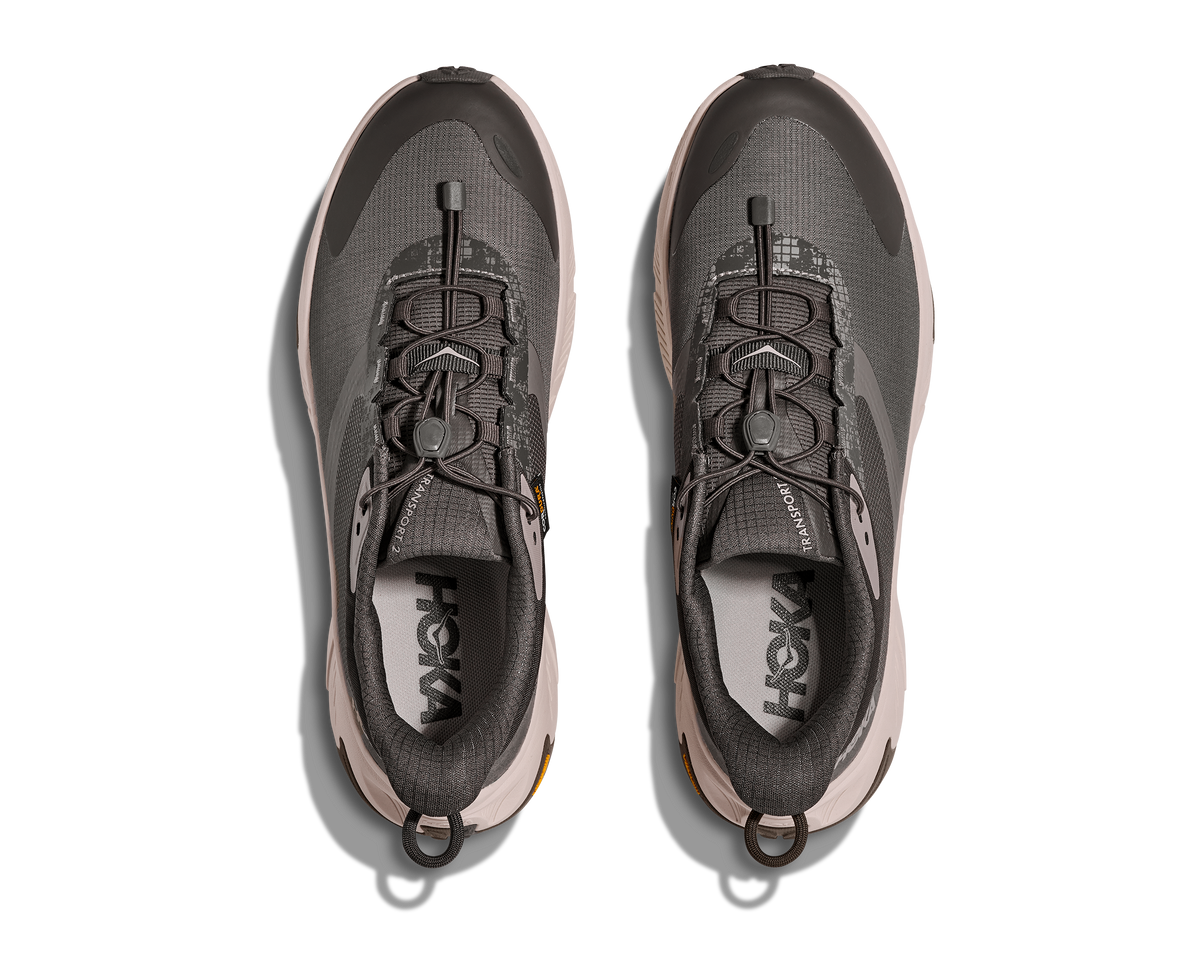 HOKA Transport 2 Hombre Gravel / Stucco — vista medial