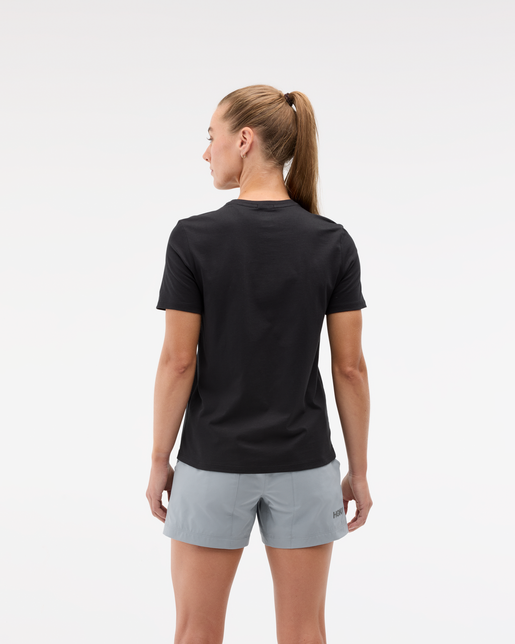 HOKA Core Logo Ctn SS Tee Mujer Black — vista medial