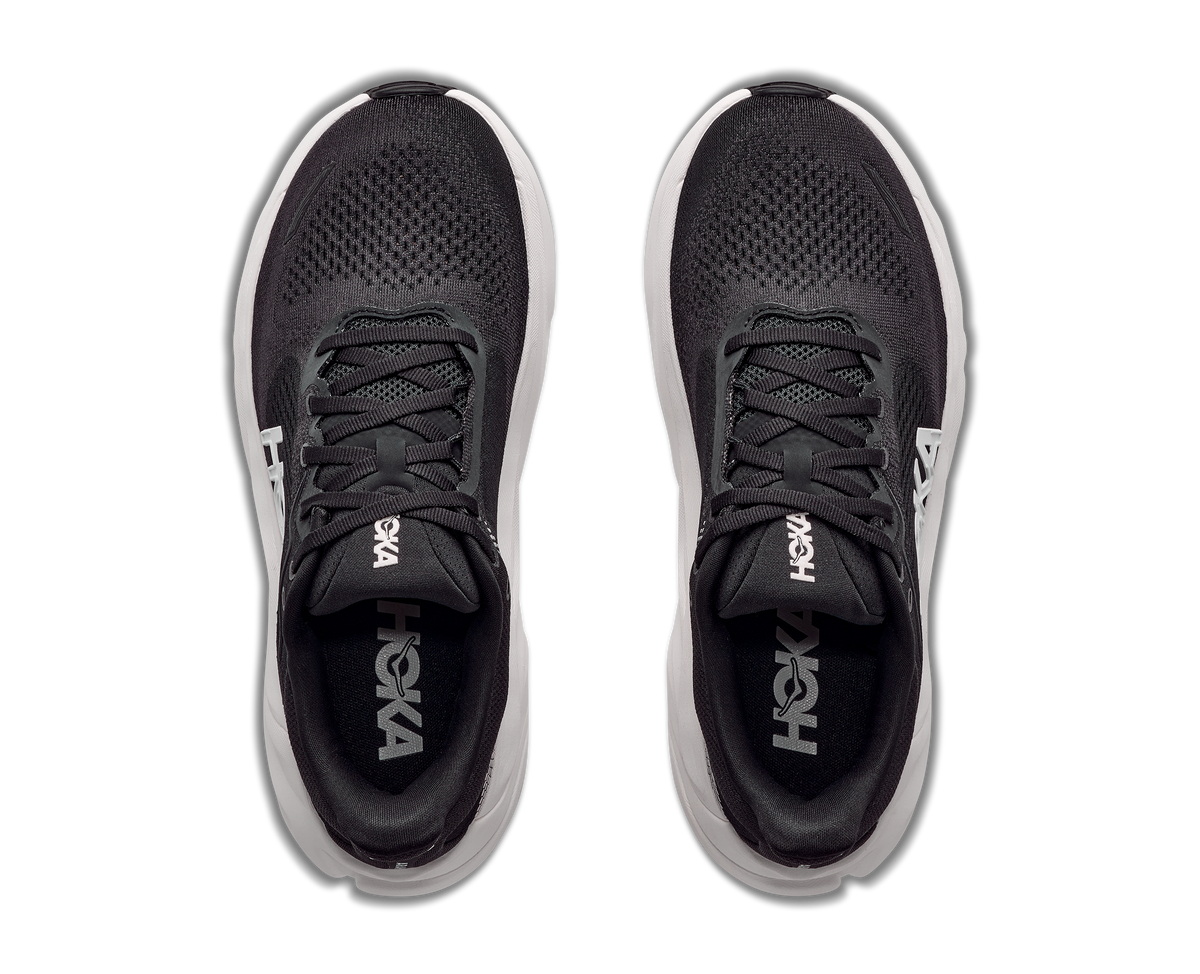 HOKA Arahi 9 Hombre Black / White — vista medial
