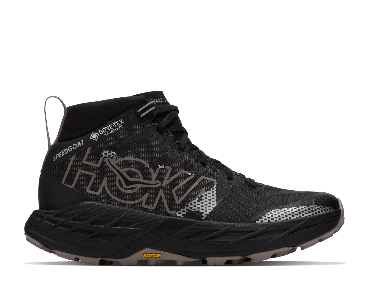 HOKA Speedgoat 7 Hike GTX Hombre Black / Pebble Grey — vista lateral