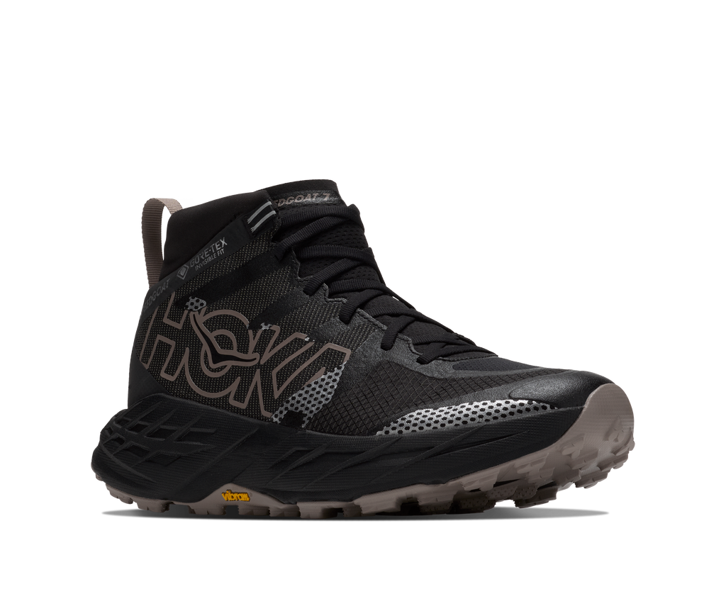 HOKA Speedgoat 7 Hike GTX Hombre Black / Pebble Grey — vista trasera