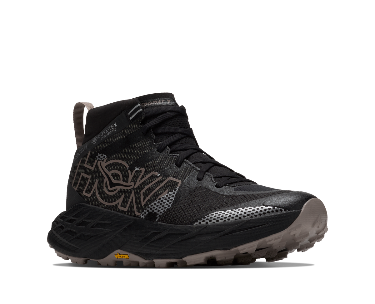 HOKA Speedgoat 7 Hike GTX Hombre Black / Pebble Grey — vista trasera