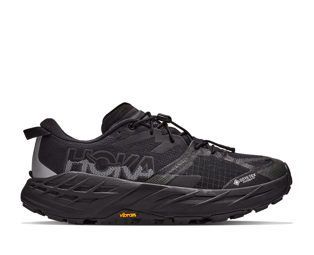 HOKA Speedgoat 7 GTX Hombre Black / Carbon Black — vista lateral