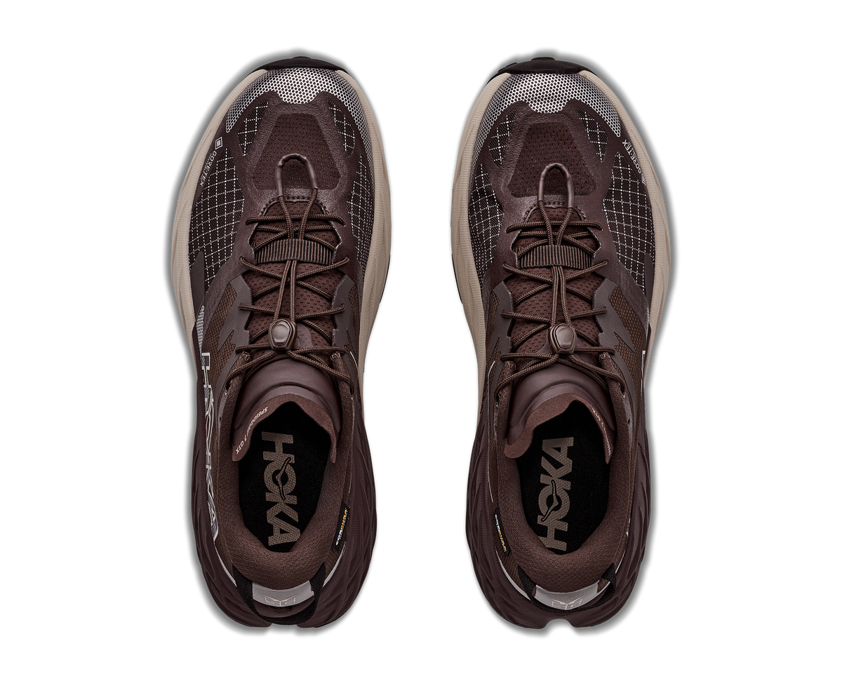 HOKA Speedgoat 7 GTX Hombre Spiced Chocolate / River Rock Grey — vista medial